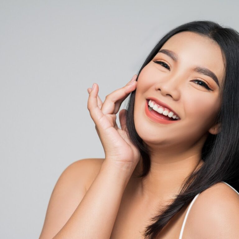 portrait-beautiful-asian-woman-with-black-hair-pink-lips_1150-51704