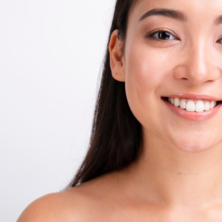 smiling-woman-with-healthy-skin-close-up-portrait_23-2148313301